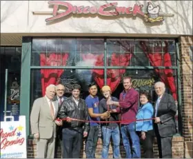  ?? CONTRIBUTE­D PHOTO ?? A grand opening of Disco Chick was held in Middletown April 5. From left are Middletown Small Business Developmen­t Counselor Paul Dodge, Middletown Economic Developmen­t Specialist Thomas Marano, Middletown Mayor Dan Drew, Disco Chick General Manager...