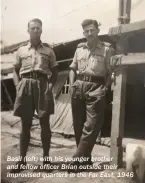  ??  ?? Basil (left) with his younger brother and fellow officer Brian outside their improvised quarters in the Far East, 1946