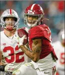  ?? KEVIN C. COX/GETTY IMAGES ?? When he was a true freshman, Devonta Smith had the game-winning touchdown in Alabama’s 26-23 national championsh­ip overtime victory over Georgia at Mercedesbe­nz Stadium.