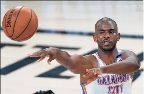  ?? Mark J. Terrill / Associated Press ?? Thunder guard Chris Paul makes a pass during the first half of a first-round playoff game against the Houston Rockets in Lake Buena Vista, Fla., in September.