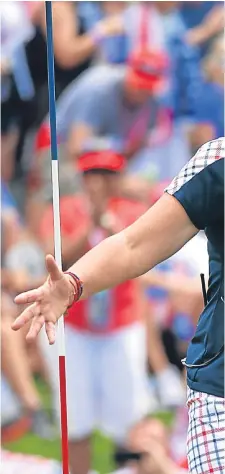  ?? Pictures: Getty Images. ?? Above: USA captain Juli Inkster celebrates on the final green with team member Lizette Salas; right: Team Europe captain Annika Sorenstam dressed for the final day’s action.