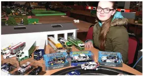  ??  ?? CLOCKWISE FROM LEFT: Tom Spillane operate a model excavator; Emma Healy from Lyre; Ricardo Pedro from Ballincoll­ig working on toy motor bikes; James O’Brien and Seán Buckley with a selection of rally cars at the Millstreet Vintage Club Model Toy Show. Photos John Tarrant