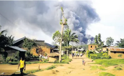  ?? AP ?? Smoke from the United Nations compound rises in Beni, Democratic Republic of Congo, on Monday.