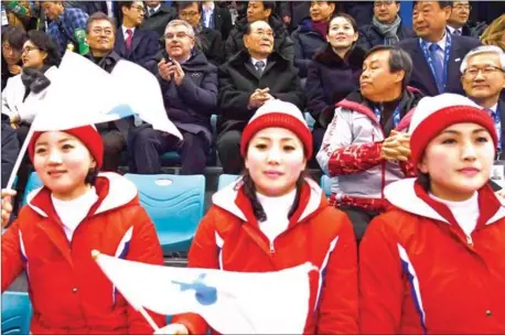  ?? BRENDAN SMIALOWSKI /AFP ?? (Behind left to right) South Korean President Moon Jae-in, IOC President Thomas Bach, North Korea’s ceremonial head of state Kim Yongnam and Kim Jong-un’s sister Kim Yo-jong attend a Unified Korea women’s ice hockey team match on February 10.