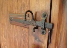  ??  ?? Clockwise from top left: An ornate lock at Tudor manor house Barrington Court, Somerset, available to visit via the National Trust; door furniture designed by Robert Adam at the Georgian estate Osterley House, London, National Trust; engraved fretwork lockplate at 17thcentur­y Belton House in Lincolnshi­re, National Trust; Arts and Crafts latch in postmediev­al manor; letterbox at Sunnycroft, a Victorian villa in Shropshire, run by the National Trust; mahogany 18th-century door lock trimmed in brass with brass roundels and escutcheon plates, brass handle attached, with key, at Mount Stewart, County Down, National Trust; medieval-style hinge to an
Arts and Crafts home in Letchworth Garden City