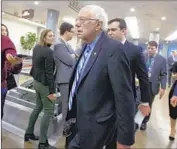  ?? Jose Luis Magana Associated Press ?? BERNIE SANDERS, in Washington, will get help in Iowa from Rep. Alexandria Ocasio-Cortez.