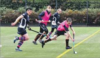  ?? 01_B42hockey0­9 ?? Harris McCormack outpaces the opposition to make one of his numerous attempts on goal.