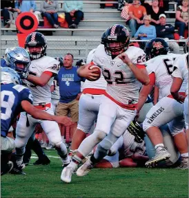  ??  ?? Colton Lane avoids a tackle on Friday night at Gordon Central. The Ramblers ran for 312 yards and got a stop on a two-point conversion in the final minute to pull out a 28-27 victory. (Calhoun Times photo/Frank Crowe)