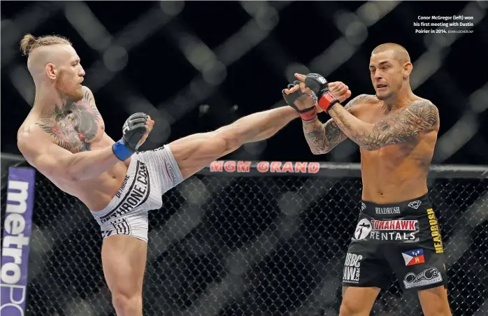  ?? JOHN LOCHER/AP ?? Conor McGregor (left) won his first meeting with Dustin Poirier in 2014.