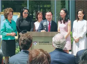  ?? LARRY LEE / CHINA DAILY ?? Chao and his daughters — (from left) Elaine, Grace, Christine, May and Angela — at the dedication ceremony of the Ruth Mulan Chu Chao Center of Harvard Business School in June 2016.