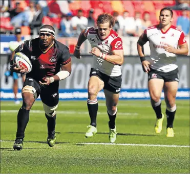  ?? Picture: MICHAEL SHEEHAN ?? EARLY STRIKE: Southern Kings loose forward Andisa Ntsila charges towards the Lions’ tryline during a Super Rugby clash at the Nelson Mandela Bay Stadium on Saturday