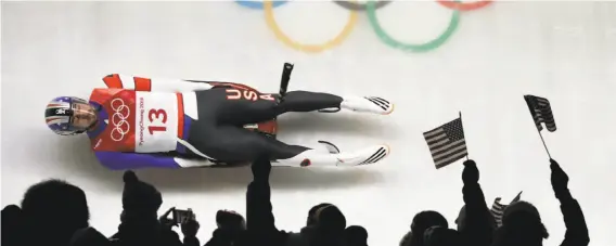  ?? Wong Maye-E / Associated Press ?? Chris Mazdzer, who finished the World Cup season 18th, slides his way to a silver medal, the first medal for an American in men’s singles luge in Olympic history.