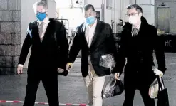  ?? — REUTERS ?? NATIONAL SECURITY THREAT? Media mogul Jimmy Lai Chee-ying (center), founder of Apple Daily, leaves the High Court on bail, in Hong Kong on Dec. 23.