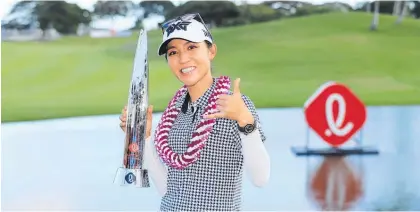  ?? Photo / AP ?? Lydia Ko celebrates a long awaited victory in Hawaii.