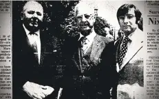  ??  ?? A photo that appeared in the Stamford Advocate after the May 1971 dedication of Latham Park shows John Latham, center, with T. Frank Cowlin, left, then the head of the Stamford parks commission, and Edward R. Mallozzi, who was president of the Bedford Street Associatio­n. Latham ran a flower shop on Bedford Street for several decades and was a Medal of Honor honoree.