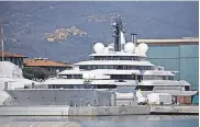  ?? FEDERICO SCOPPA/ AFP VIA GETTY IMAGES ?? Putin’s empire is believed to include the 459- foot yacht Scheheraza­de, docked in Tuscany, Italy, in March.