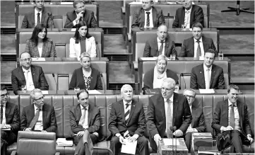  ??  ?? Morrison speaks in the House of Representa­tives at Parliament House in Canberra. — Reuters photo