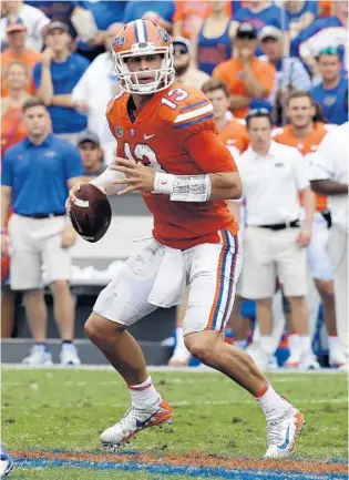  ?? JOHN RAOUX/ASSOCIATED PRESS FILE ?? As the battle for the UF starting QB job continues, sophomore Feleipe Franks, shown last season against Vandy, took a big step forward in the competitio­n with a four-TD effort in the Gators’ scrimmage Saturday.