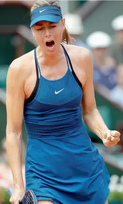  ?? AP ?? Maria Sharapova of Russia reacts after scoring a point against Karolina Pliskova of the Czech Republic during their third round match of the French Open at the Roland Garros stadium in Paris, France, on Saturday. Sharapova won 6-2, 6-1. —