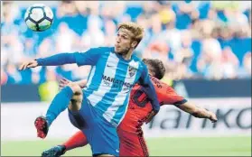  ?? FOTO: EFE ?? Keko Gontán y Kevin Rodrigues pelean por un balón aéreo