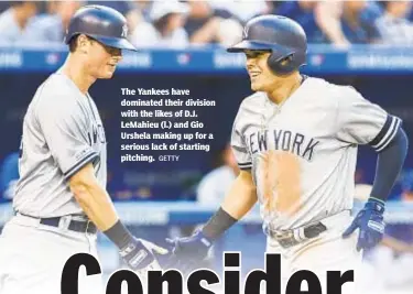  ?? GETTY ?? The Yankees have dominated their division with the likes of D.J. LeMahieu (l.) and Gio Urshela making up for a serious lack of starting pitching.