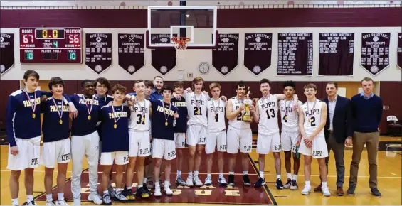  ?? COURTESY PJP BASKETBALL ?? The Pope John Paul II poses with its first-place medals after winning Saturday’s District 1-4A championsh­ip over Lower Moreland.