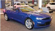  ?? GENE J. PUSKAR/ASSOCIATED PRESS ?? A 2020 Camaro on display at the Pittsburgh Internatio­nal Auto Show in February 2020 in Pittsburgh. The Chevrolet Camaro is going out of production.