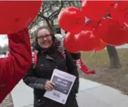  ?? RICK MADONIK/TORONTO STAR ?? Nikkie Edwards, who has a 1-year-old daughter, joins a rally at Queen’s Park on Monday to push for $10-a-day daycare.