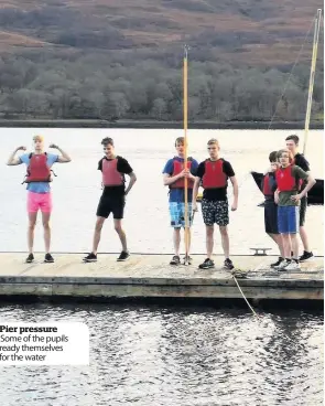  ??  ?? Pier pressure Some of the pupils ready themselves for the water