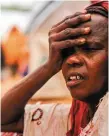  ??  ?? A Somali woman at Tawakal IDP camp in Mogadishu