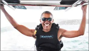  ??  ?? Safely back on board: A triumphant Obama after winning the challenge
