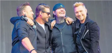  ?? Photo / WireImage ?? Michael Graham (left), Keith Duffy, Shane Lynch and Ronan Keating are reaching the end of their Boyzone journey.