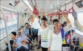  ?? HT PHOTOS ?? Left to right: A speciallya­bled child being helped out of the elevator at the Metro station; LMRC staff and teachers of Drishti Samajik Sansthan guiding the kids towards the platform, and children enjoying the Metro ride from Charbagh station to...