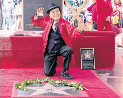  ?? AP PHOTOS ?? Actor James Hong poses after being honoured with a star on the Hollywood Walk of Fame in 2022 on in the Hollywood section of Los Angeles.