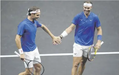  ?? Foto: dpa ?? Fast wäre Federer und Nadal das sportliche Märchen von London gelungen.