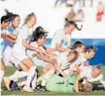  ?? Photo / AP ?? The New Zealand team celebrate after their penalty shootout win over Japan at the quarter-finals of the Fifa Under-17 Women’s World Cup.