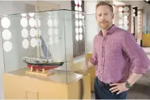  ??  ?? The Amazing Race Canada host Jon Montgomery poses with a model of the Bluenose schooner at the Castillo de la Real Fuerza.