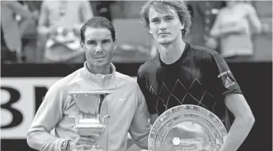  ?? Foto: dpa ?? Nach einem harten Match: Sieger Rafael Nadal und Finalist Alexander Zverev.