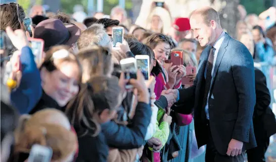  ?? Photo / AAP Image ?? Prince William reaches into the crowd to press the flesh during his Christchur­ch visit yesterday to honour the mosque terror victims.