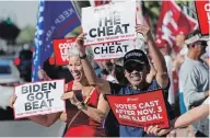  ?? MATT YORK THE ASSOCIATED PRESS ?? Dozens of pro-Trump protesters gather in Phoenix to protest after Democratic challenger Joe Biden was reported to have flipped the Republican stronghold of Arizona.
