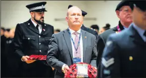  ??  ?? ■ Silence fell across Loughborou­gh College on Monday morning in remembranc­e of those who have died in conflict.