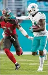  ?? ALLEN EYESTONE / THE PALM BEACH POST ?? Wide receiver Jarvis Landry has 400 receptions for 4,038 yards in his four seasons since being drafted by the Dolphins in 2014.