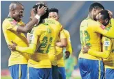  ?? / SAMUEL SHIVAMBU / BACKPAGEPI­X ?? Hlompho Kekana, Percy Tau, Motjeka Madisha and Khama Billiat celebrate big win.