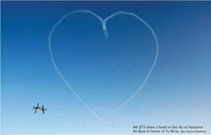  ?? (Baz Ratner/Reuters) ?? IAF JETS draw a heart in the sky at Hatzerim Air Base in honor of Tu Be’av.