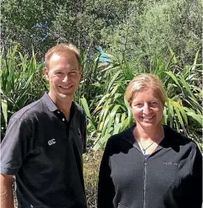  ?? PHOTO: SUPPLIED ?? Nigel Sowman, viticultur­ist Dog Point Vineyard viticultur­ist Nigel Sowman with Anna Dunne, Ivan and Margaret Sutherland’s daughter, in front of some of the native plantings.