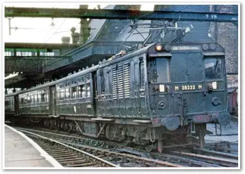  ?? RAIL PHOTOPRINT­S/REG BARON. ?? The Lancaster-Morecambe electrific­ation was converted from 25 to 50 hertz in 1953 for assessment. In 1965, M28222 departs Lancaster Green Ayre with a service for Lancaster Castle.