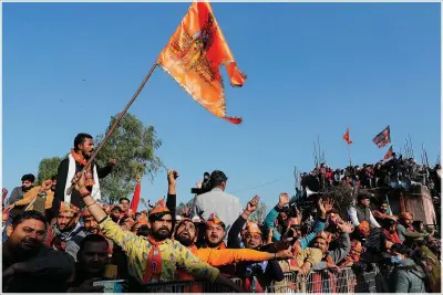  ?? (AP/Rajesh Kumar Singh) ?? Supporters of India’s ruling Bharatiya Janta Party cheer Saturday during an election rally in Shamli.