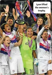  ??  ?? Lyon lifted the women’s
trophy.