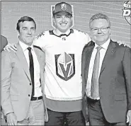  ?? AP/NAM Y. HUH ?? Cody Glass (center) was chosen sixth Friday in the first round of the NHL draft by the expansion Vegas Golden Knights in Chicago.