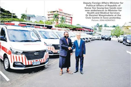  ?? Picture: JONA KONATACI ?? Deputy Foreign Affairs Minister for Political Affairs of Republic of Korea Yeo Seung-bae hands over new ambulances to Minister for Health and Medical Services Dr Ifereimi Waqainabet­e at the Civic Centre in Suva yesterday.